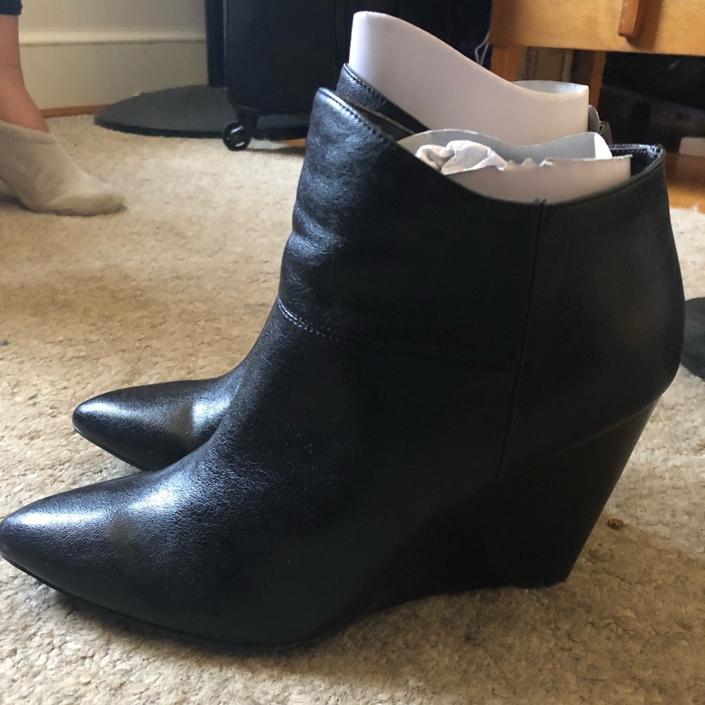 Nine West - Sleek Black bootie on 4" wedge.